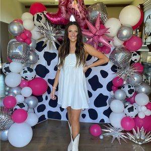 White sundress with bow in the back